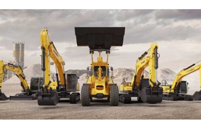 Lift boom construction equipment names heavy parking lot