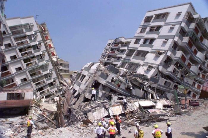 Collapsed partially surfside dozens partly rubble hangs fla multistory npr partial collapses unaccounted sparking morning multi chandan khanna getty