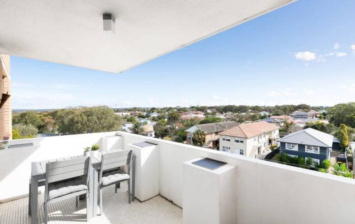 Desain rumah di tanah menurun